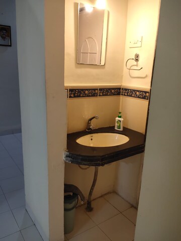 Bathroom in 2 BHK Apartment at Sai Dham CHS, Dhanori – for Rent
