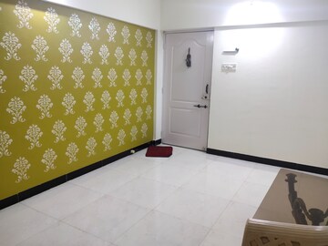 Room in 2 BHK Apartment at Sai Dham CHS, Dhanori – for Rent