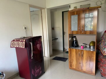 Living Room in 1 BHK Apartment at Palladium Homes, Dhanori – for Rent