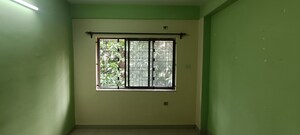 Bedroom in 3 BHK Apartment at Green Woods Premium, Kaikhali – for Sale