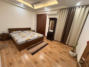Bedroom in 3 BHK Builder Floor at Ansal Plaza Sector-23, Sector 23 – for Rent