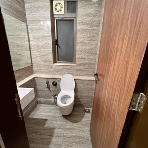 Bathroom in 2 BHK Apartment at Serenity Heights, Ram Nagar – for Rent