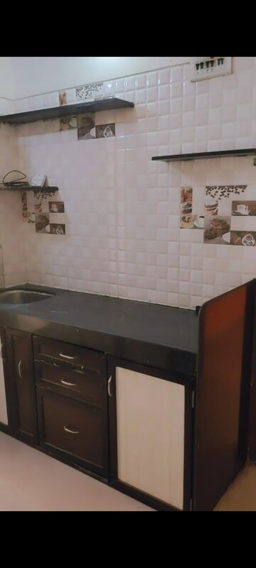 Kitchen in 1 BHK Apartment at Sai Rydam Grapes Tower, Nalasopara West – for Rent