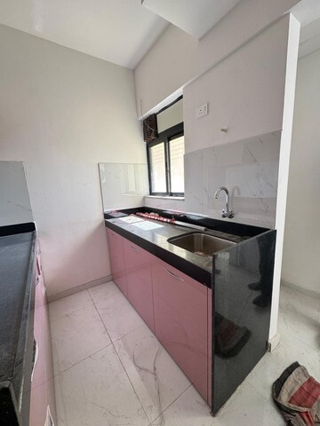 Kitchen in 1 BHK Apartment at Runwal Gardens Phase I, Dombivli East – for Rent