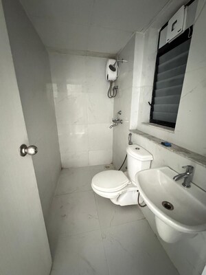 Bathroom in 1 BHK Apartment at Runwal Gardens Phase I, Dombivli East – for Rent