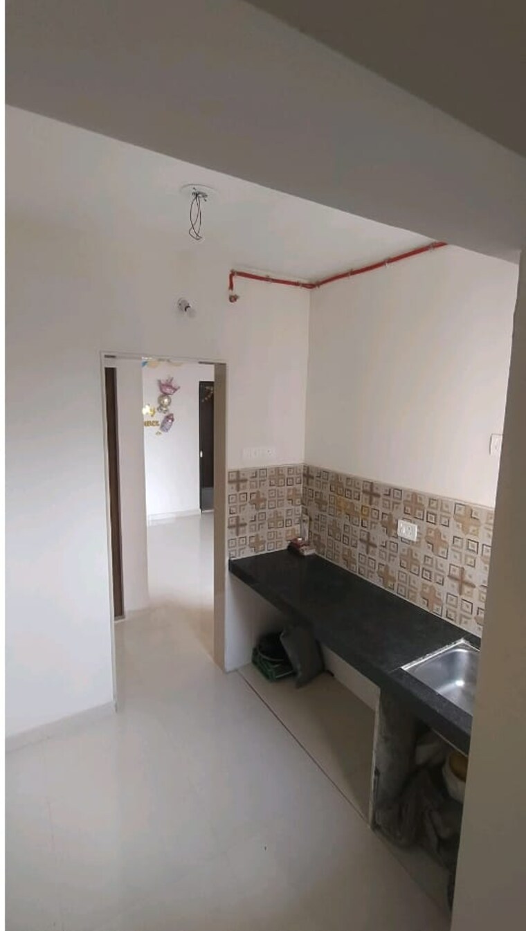 Kitchen, kalpataru-immensa 2 Bedroom 771 Sq.Ft. Apartment In Kolshet Road Thane 9681487