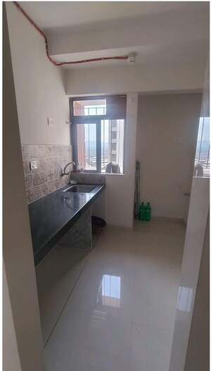 Kitchen in 2 BHK Apartment at Kalpataru Immensa, Kolshet Road – for Sale
