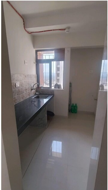 Kitchen in 2 BHK Apartment at Kalpataru Immensa, Kolshet Road – for Sale
