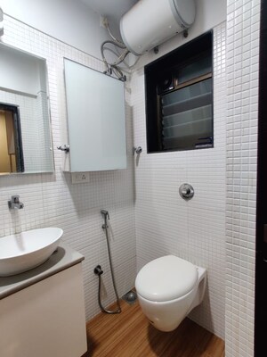 Bathroom in 2 BHK Apartment at Butter Cups Apartment, Bandra West – for Rent