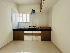 Kitchen in 1 BHK Apartment at Paranjape Madhukosh Phase III, Dhayari – for Sale