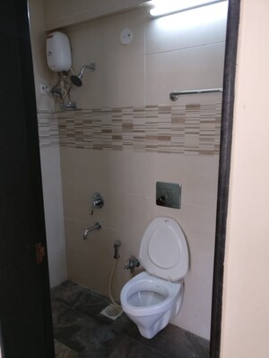 Bathroom in 2 BHK Apartment at Royal Crystal Wing B, Malad East – for Rent