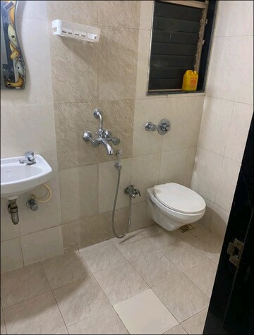 Bathroom in 1 BHK Apartment at Cosmic Heritage, Malad East – for Rent