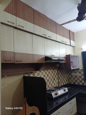 Kitchen in 2 BHK Apartment at Kopar Khairane Sector 14 – for Rent