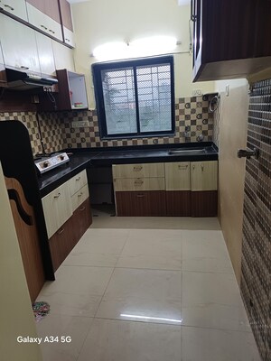 Kitchen in 2 BHK Apartment at Kopar Khairane Sector 14 – for Rent