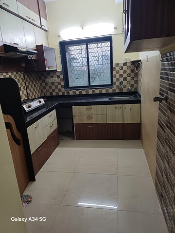 Kitchen in 2 BHK Apartment at Kopar Khairane Sector 14 – for Rent