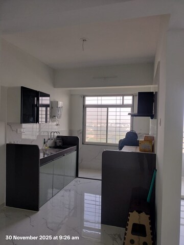 Kitchen in 2 BHK Apartment at Tanish Park, Charholi Budruk – for Rent
