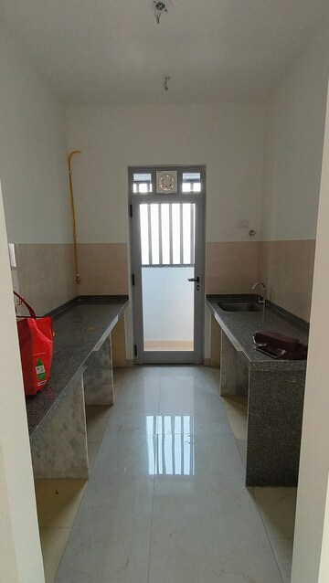 Kitchen in 2 BHK Apartment at Piramal Revanta Tower 3 and 4, Mulund West – for Rent