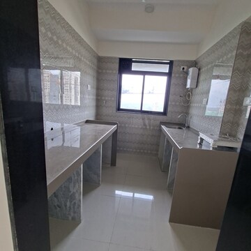 Kitchen in 1 BHK Apartment at Lodha Versova, Versova – for Sale