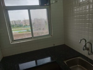 Kitchen in 1 BHK Builder Floor at Nirvana Lifecity, Lohgaon – for Rent