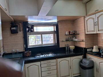 Kitchen in 3 BHK Apartment at Sher E Punjab, Andheri East – for Sale
