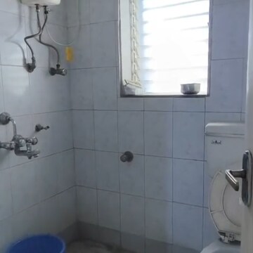 Bathroom in 3 BHK Apartment at Vasant Leela Complex, Anu Nagar – for Rent