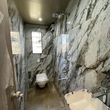 Bathroom in 1 BHK Apartment at Nahars Everest, Yari Road – for Rent