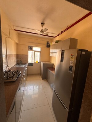 Kitchen in 3 BHK Apartment at SD Shree Vighneshwar Heights, Andheri West – for Rent