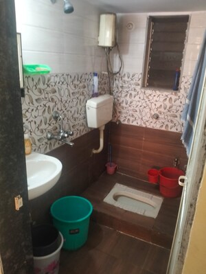 Bathroom in 2 BHK Apartment at Patel Prayosha Yogi Niwas, Ambernath West – for Sale