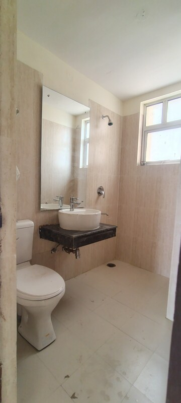 Bathroom in 3 BHK Apartment at Ansal Highland Park, Sector 103 – for Rent