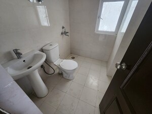 Bathroom in 1 BHK Apartment at VVIP Nest, Raj Nagar Extension – for Sale