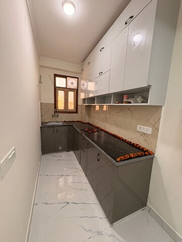 Kitchen in 2 BHK Apartment at Palm Residency Chhatarpur, Chattarpur – for Rent