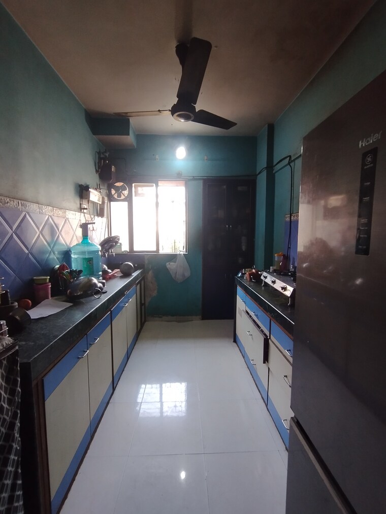 Kitchen, garden-court 2 Bedroom 655 Sq.Ft. Apartment In Waghbil Thane 9682395