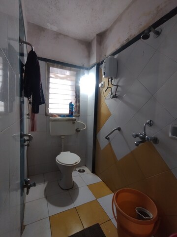 Bathroom in 2 BHK Apartment at Garden Court, Waghbil – for Sale