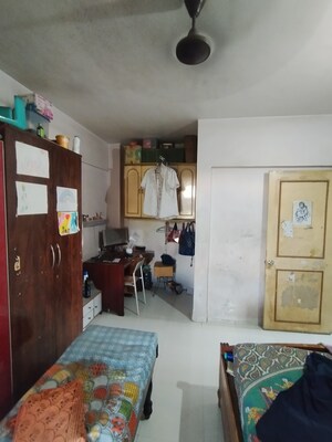 Bedroom in 2 BHK Apartment at Garden Court, Waghbil – for Sale