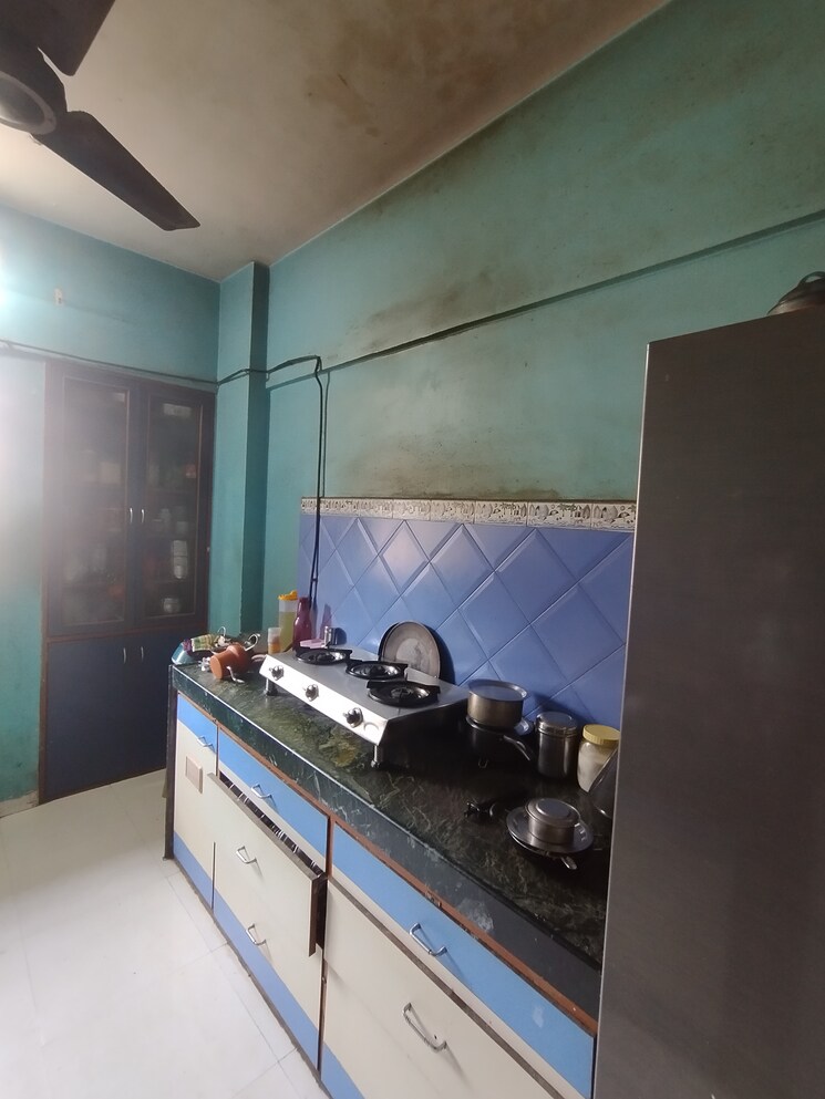 Kitchen, garden-court 2 Bedroom 655 Sq.Ft. Apartment In Waghbil Thane 9682395