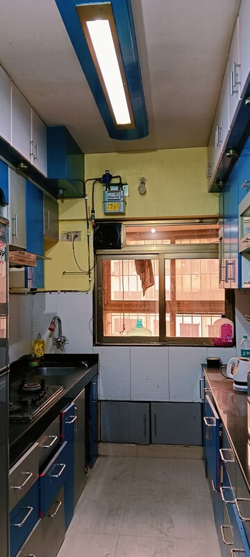 Kitchen in 3 BHK Apartment at Ajmera Cosmic Heights, Bhakti Park – for Sale