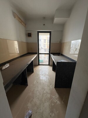 Kitchen in 2 BHK Apartment at Lodha Casa Lagoona, Shilphata – for Rent