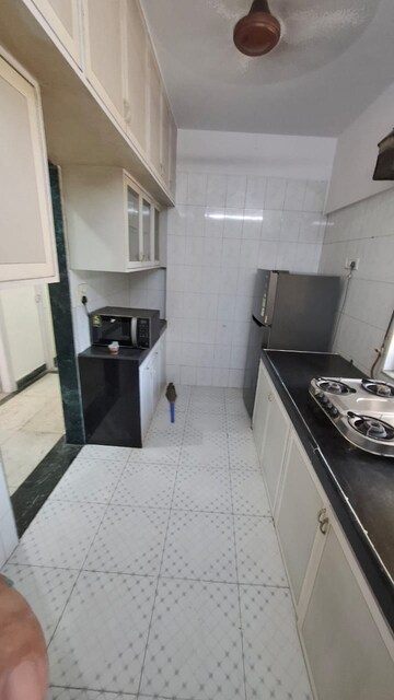 Kitchen in 2 BHK Apartment at Orchid Enclave Powai, Chandivali – for Rent