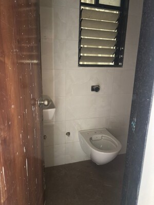 Bathroom in 2 BHK Apartment at Haware Intelligentia Spectrum, Thane West – for Sale