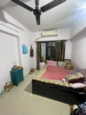 Bedroom in 2 BHK Apartment at Dosti Flamingos, Parel – for Rent