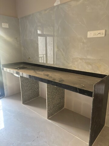 Kitchen in 1 BHK Apartment at Haware Intelligentia Spectrum, Thane West – for Sale