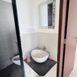 Bathroom in 1 BHK Apartment at Pharande Kairosa, Mumbai Bangalore Highway – for Sale