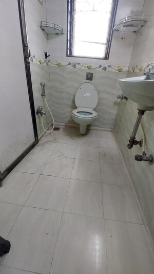Bathroom in 2 BHK Apartment at Kesar Residency, Kandivali West – for Rent