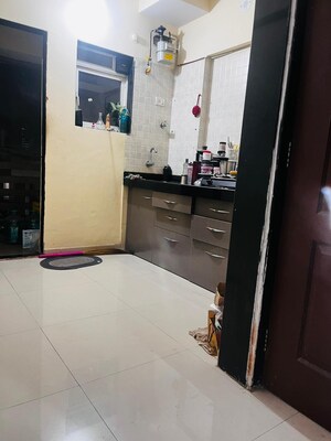 Kitchen in 1 RK Apartment at Cosmos Orchid, Ghodbunder Road – for Rent
