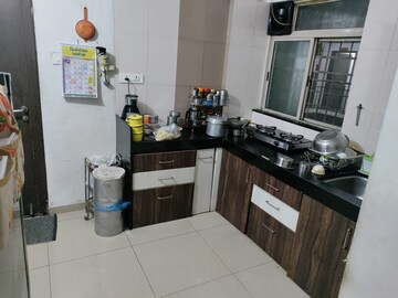 Kitchen in 1 BHK Apartment at Sudhir Krishnakala CHS, Dahanukar Colony – for Rent