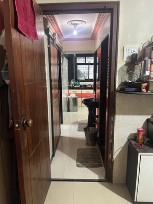 Living Room in 1 BHK Apartment at Kopar Khairane – for Sale