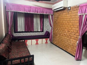 Living Room in 1 BHK Apartment at Kopar Khairane – for Sale