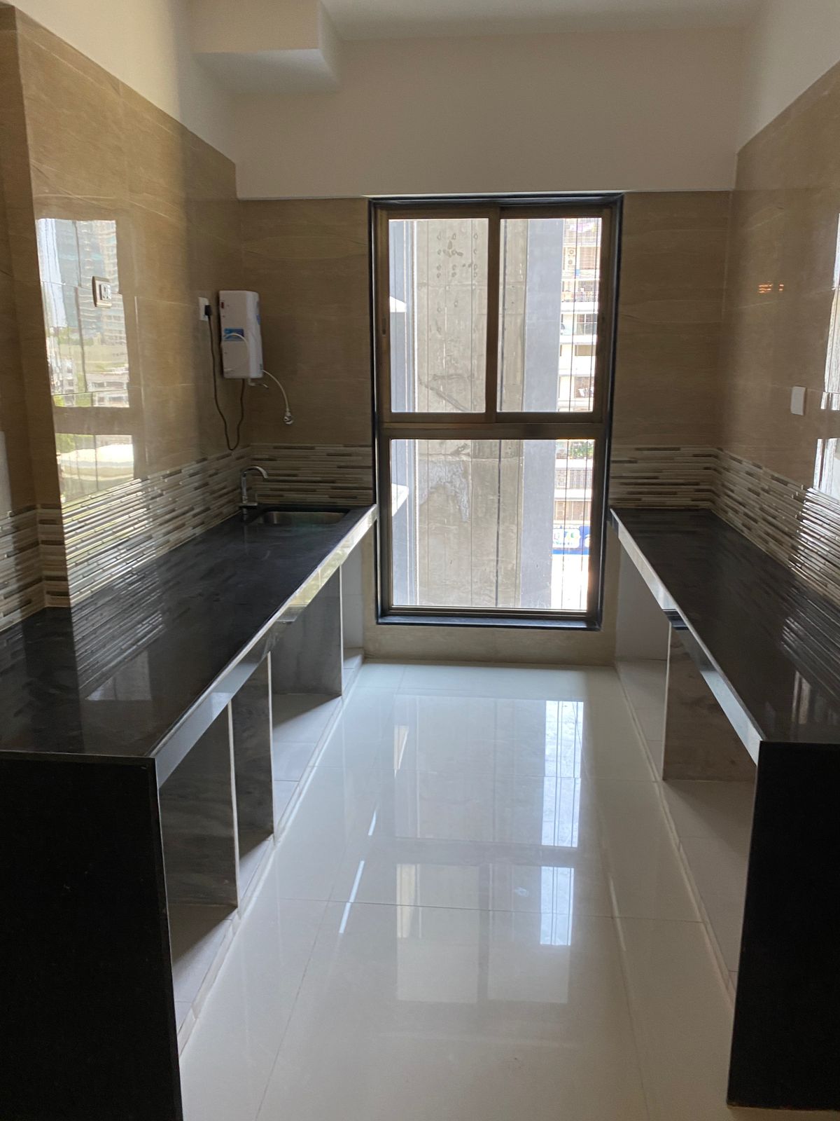 Kitchen in 2 BHK Apartment at Rajesh Raj Infinia, Malad West – for Rent