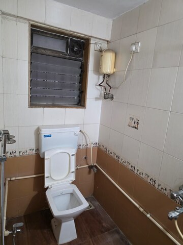 Bathroom in 1.5 BHK Apartment at Paranjape Schemes Royal Court, Andheri East – for Rent