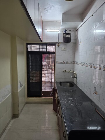 Kitchen in 1.5 BHK Apartment at Paranjape Schemes Royal Court, Andheri East – for Rent